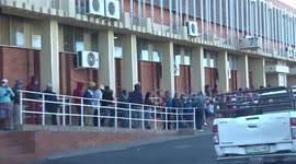 Poor unemployed people ignore social distancing in South Africa to get money/grants from post office during Covid-19 pandemic