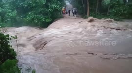 Tropical storm flash flooding leave residents stranded in the Philippines