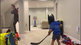 Canadian 4-year-old sinks impressive basketball trick shot using hockey stick all while blindfolded