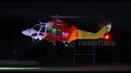 Rescue helicopter lands after rescuing injured driver in Australia