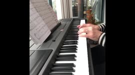 Old hands playing an old classic hymn