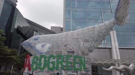 Whales made of plastic bottles outside Thai stock exchange raise ocean pollution awareness