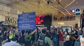 Hong Kong Police raised a blue warning flag in the shopping mall in Causeway Bay during the China National Day protest