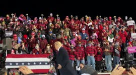Maskless Trump tosses hats to Minnesota crowd hours before positive COVID test