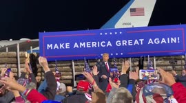 Maskless Trump tosses hats to Minnesota crowd hours before positive COVID test