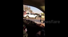 Kansas Trump supporters gather in cars for rally in support of the President