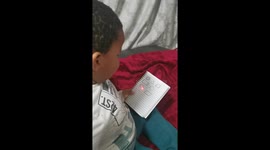 Four-year-old recites names of different shapes to mother.
