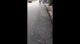 Young boy in face mask jogging