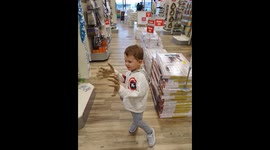 Toddler with creepy zombie hands.