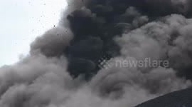 Spectacular footage shows clouds of ash spewing from Mount Etna