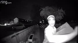A Domino’s pizza delivery driver rubs tub of ice cream on his crotch when waiting for customer at the door.