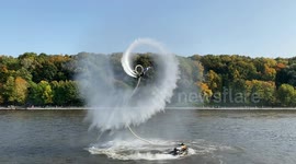 Russian woman performs incredible somersaults while flyboarding over Moscow lake