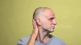 Cool stop-motion video shows guy getting reverse haircut