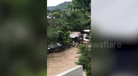 Riverside homes severely flooded during rainy season in the Philippines