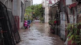 Streets turn to rivers and homes flooded after heavy rain in the Philippines