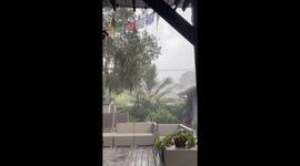 Pouring rain in backyard