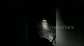 Forest guard pleads lion to let him go in western India