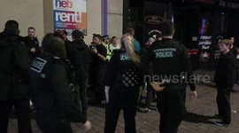 Police presence as large crowds of students gather in Nottingham street after 10pm curfew