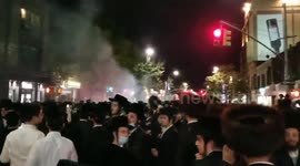 Ultra-Orthodox community members protest against new COVID-19 restrictions in New York