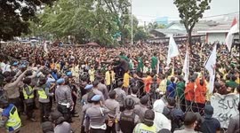 Thousands gather in Indonesia's Padang protesting against government's new labour laws