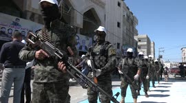 Members of Palestinian Islamic Jihad group take part in rally to mark 33rd anniversary