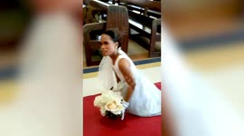 Disabled bride born without legs summons the strength to walk down the aisle on wedding day
