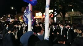 Orthodox Jews protest against COVID-19 restrictions, wave Trump campaign flags