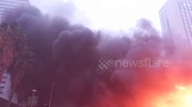 A Transjakarta bus stop in the heart of the capital Jakarta, was set on fire by a number of demonstrators who rejected the work copyright bill