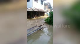 Floods swamp homes in Philippines after heavy rain