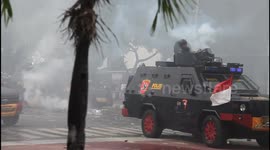 Indonesian protesters clash with police over government's jobs law