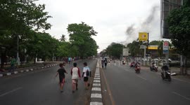 Children Playing Football on the Street During Student Demonstrations