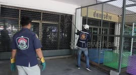 Monitor lizard found climbing on shop front to try and reach pet cats inside