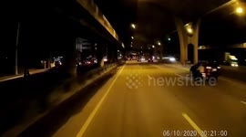 Motorcycle rider crashes after hitting piece of wood lying in road