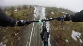 Mountain biking crash on snowy Welsh hillside