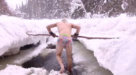 Group enjoy a 'polar bath' in frozen Canadian forest