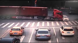 Lorry smashes into car making a U-turn at junction in China