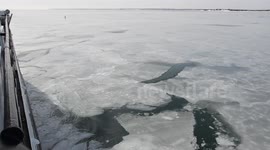 Ferry breaks through ice in Nantucket Sound, MA, US