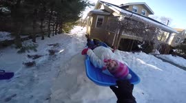 Dad builds back yard luge track for kids