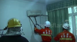 Firemen pull snake from aircon unit in China bedroom