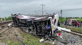 Train crashes into bus killing at least 17 and injuring 40 in Thailand