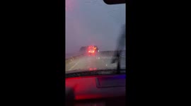 Box truck crossing the Interstate 10 bridge in Lake Charles, Louisiana during Hurricane Delta