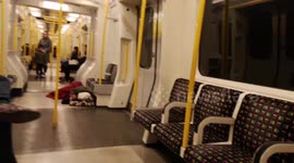 Rough Sleeper On The London Underground