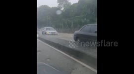 Flooding in Trinidad leaves vehicles stranded on submerged roads
