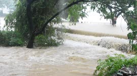River overflows causing flooding in the Philippines