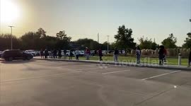 US: Voters Lined Up For First Day Of Early Voting In Texas 5
