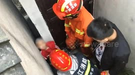 Chinese firefighters free 5-year-old boy's head from narrow gap in between walls