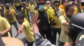 Violence erupts between pro-monarchy and anti-government protesters in Thailand