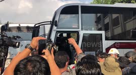 Thai protesters attack police bus blocking path to parliament building