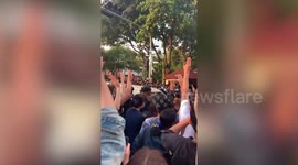 Protesters confront Thai king is defiance of strict lese-majeste laws