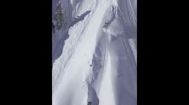 Skiing avalanche with tripple jump